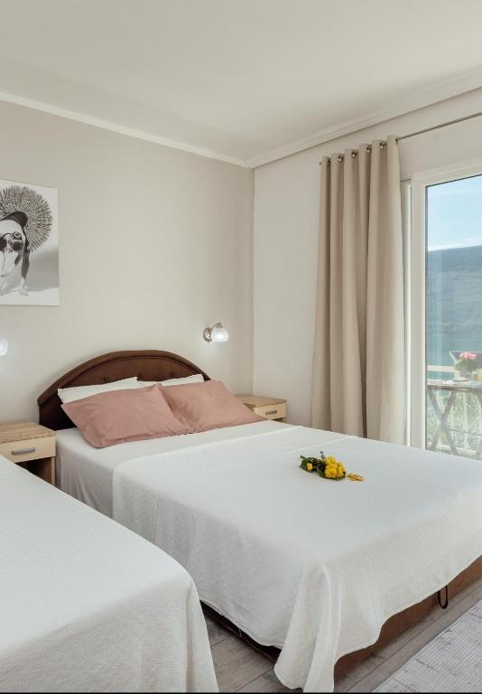 Postel nebo postele na pokoji v ubytování Apartmani Vico
