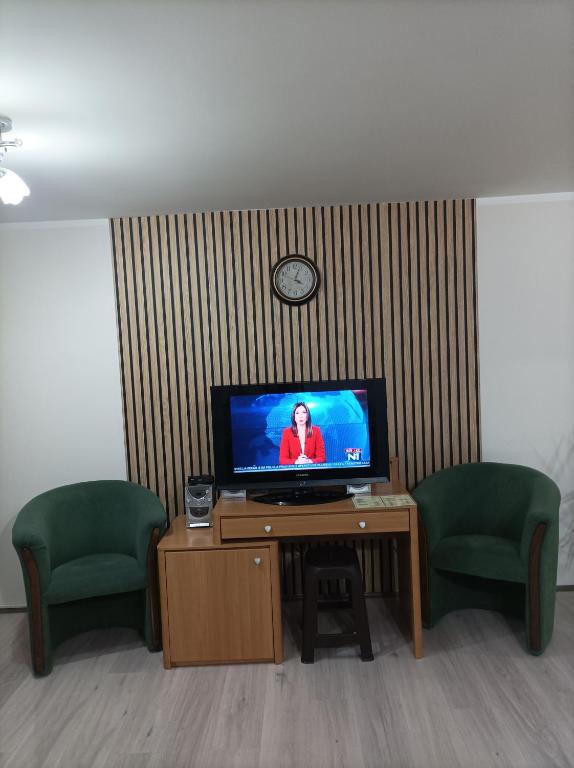 TV a/nebo společenská místnost v ubytování ARIANA apartman