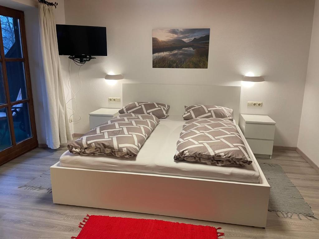 Postel nebo postele na pokoji v ubytování Bergnest