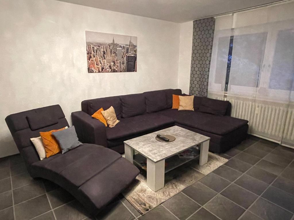 a living room with a couch and a coffee table at International 4 in Bad Harzburg