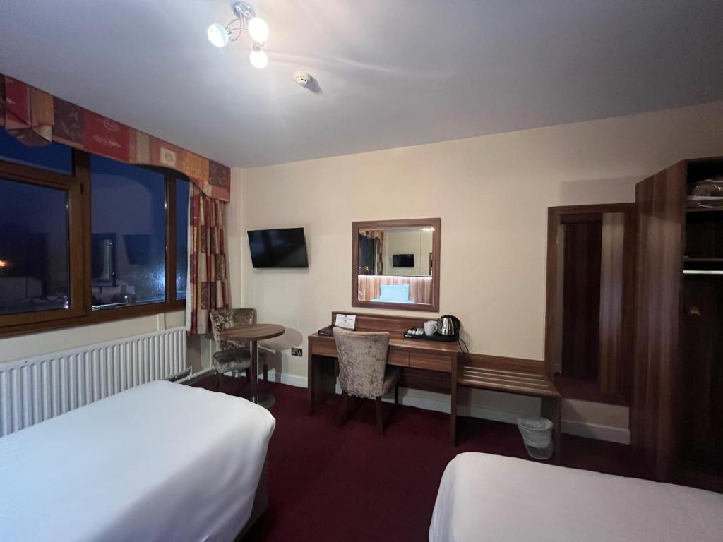 Μια τηλεόραση ή/και κέντρο ψυχαγωγίας στο West County Hotel