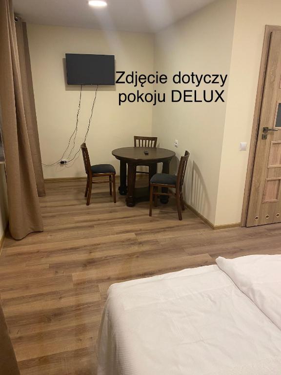 Ліжко або ліжка в номері Leśna Polana