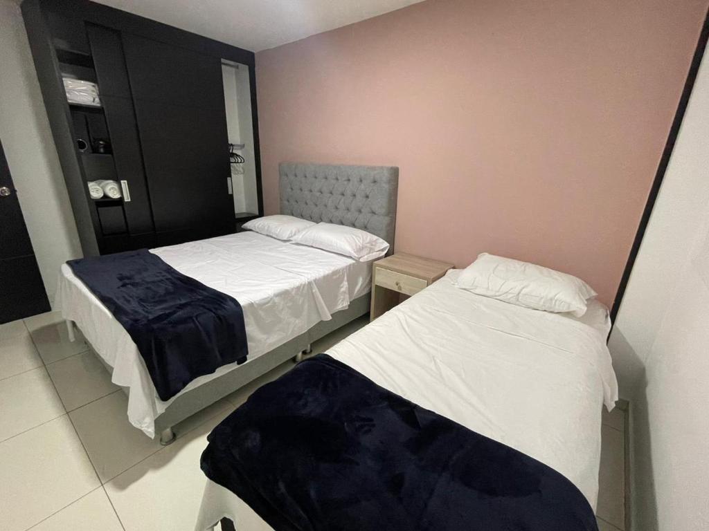 Postel nebo postele na pokoji v ubytování Hermoso apartamento en San Gil
