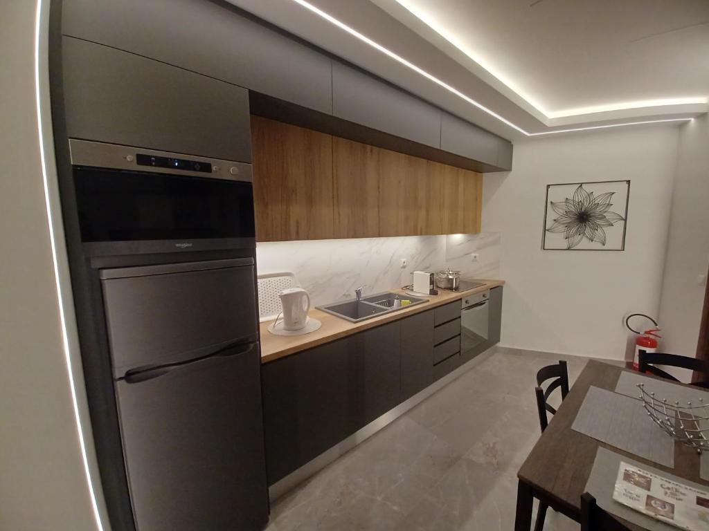 Kuchyň nebo kuchyňský kout v ubytování Top View Apartment