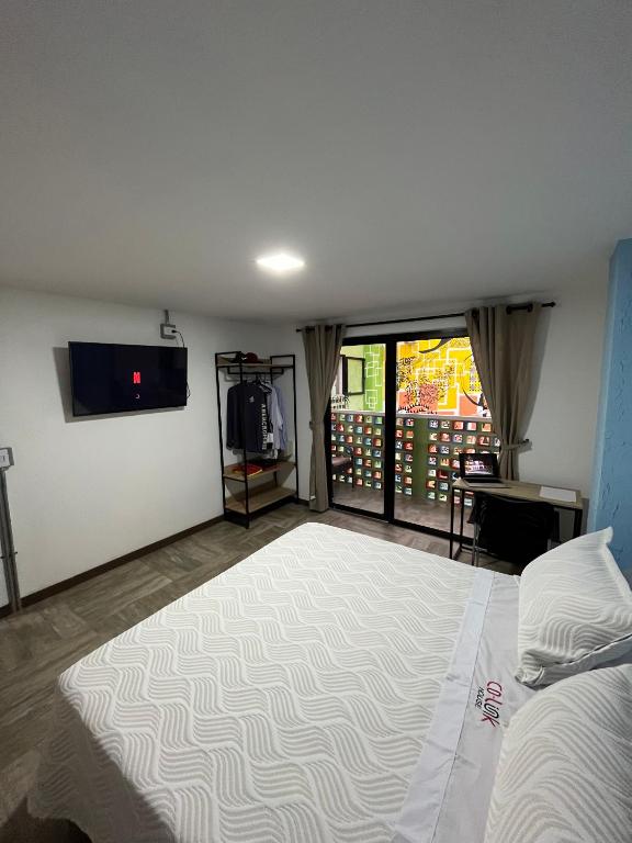 Postel nebo postele na pokoji v ubytování CoLinkHouse Hotel