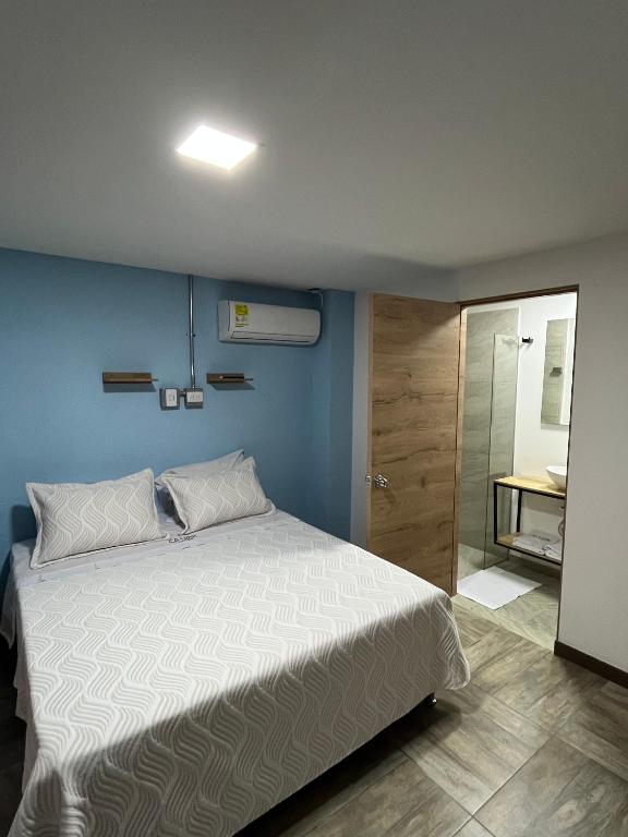 Postel nebo postele na pokoji v ubytování CoLinkHouse Hotel