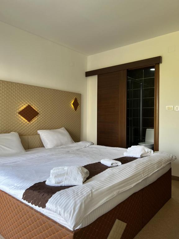 Postel nebo postele na pokoji v ubytování Hotel Andalus