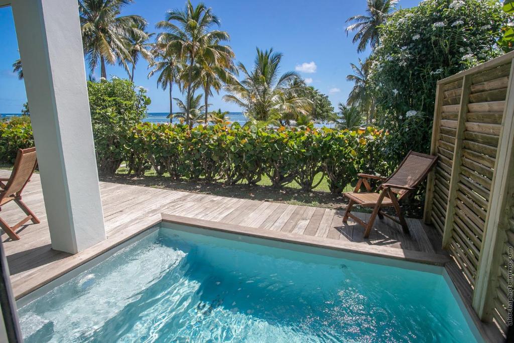 Bazén v ubytování Villa Maorie 5 chambres avec piscine privée nebo v jeho okolí