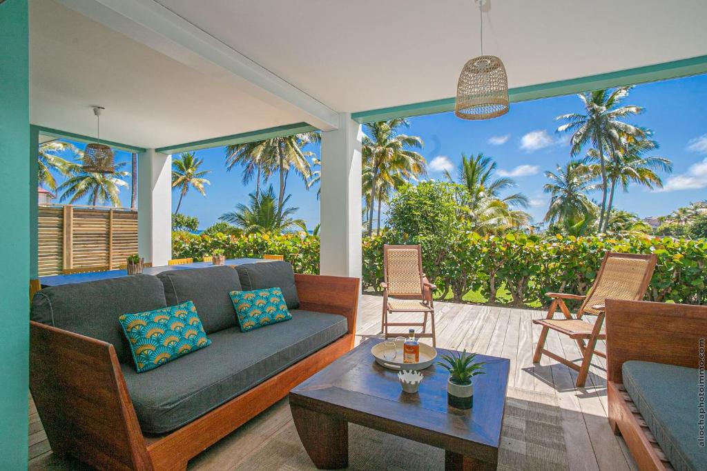 Posezení v ubytování Villa Maorie 5 chambres avec piscine privée