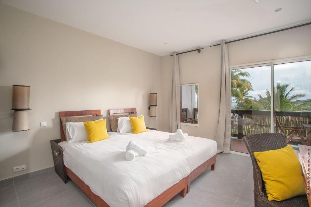 Postel nebo postele na pokoji v ubytování Villa Maorie 5 chambres avec piscine privée
