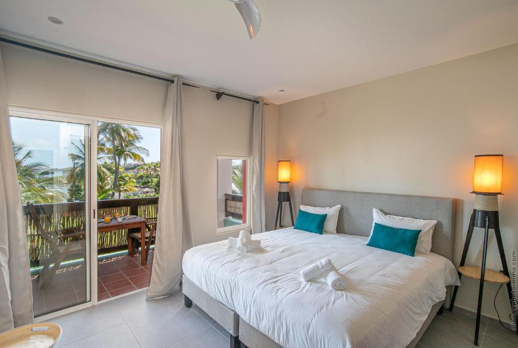Postel nebo postele na pokoji v ubytování Villa Maorie 5 chambres avec piscine privée