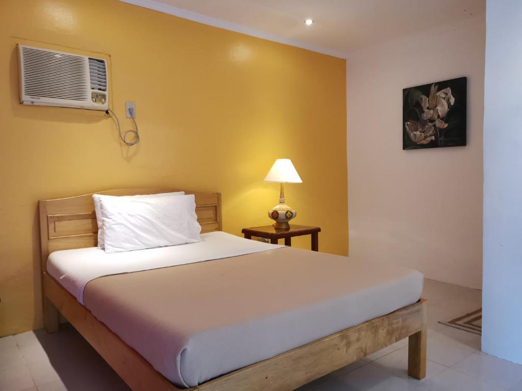 Postel nebo postele na pokoji v ubytování La Vida Hostel Samal Island