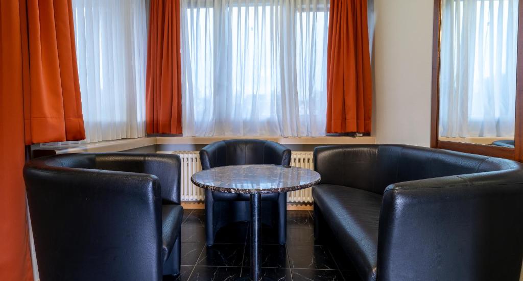 Posezení v ubytování Hotel Linde - 24h Self Check-in