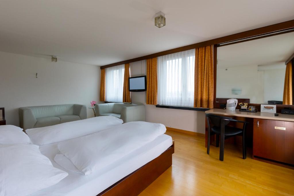 Postel nebo postele na pokoji v ubytování Hotel Linde - 24h Self Check-in