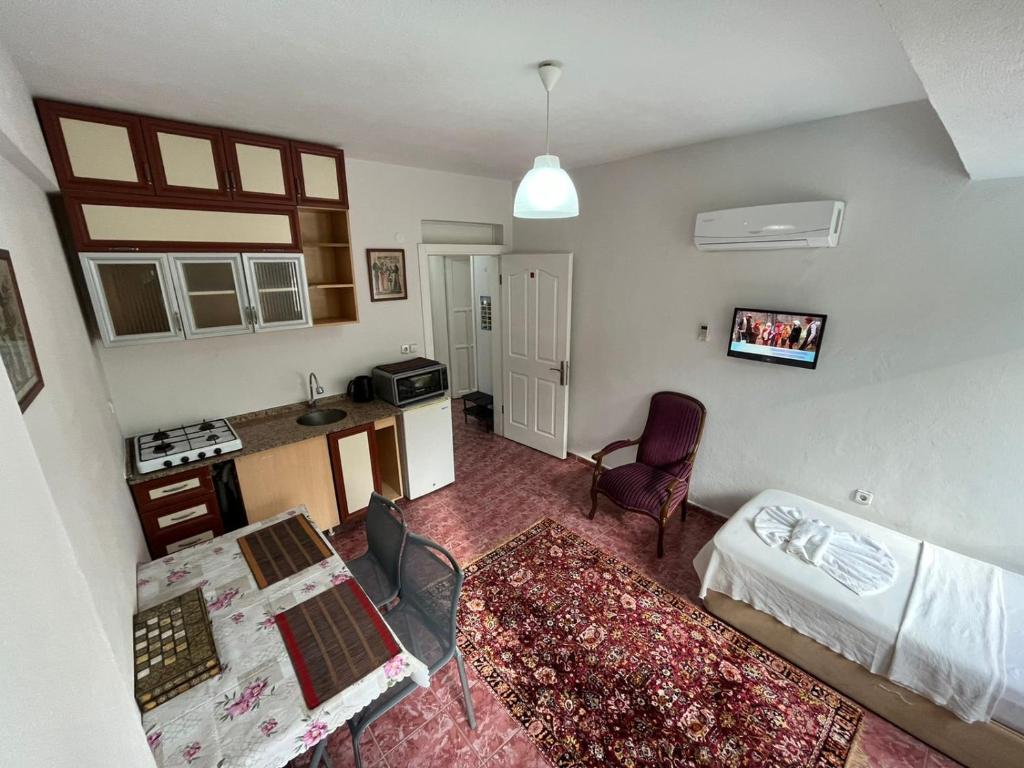 Kuchyň nebo kuchyňský kout v ubytování Şato Apart Hotel