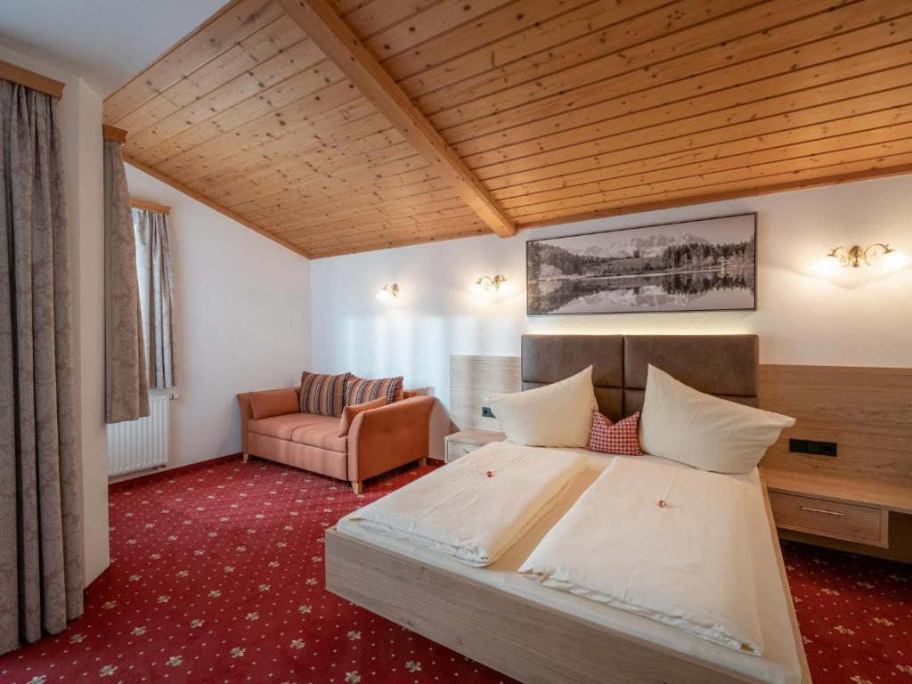 Posteľ alebo postele v izbe v ubytovaní Landhaus Alpina