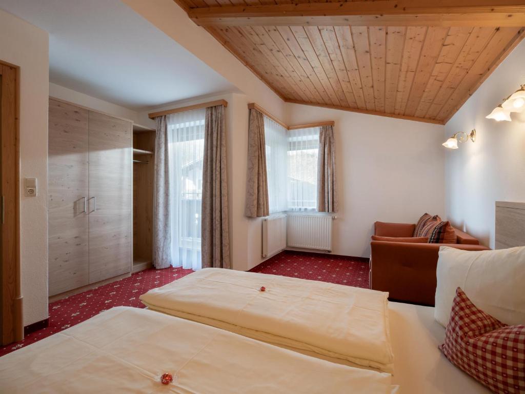 Posteľ alebo postele v izbe v ubytovaní Landhaus Alpina