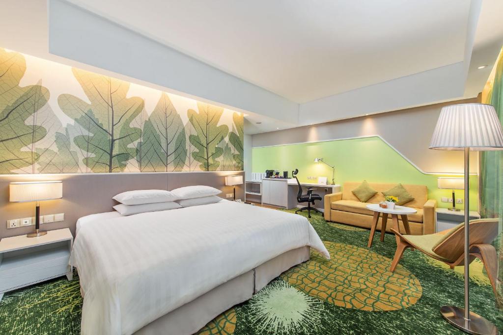 Postel nebo postele na pokoji v ubytování Sunway Velocity Hotel Kuala Lumpur