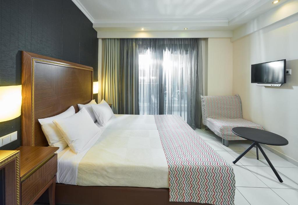 A bed or beds in a room at Mediterranean Resort