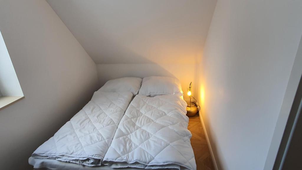 Postel nebo postele na pokoji v ubytování Haus am Meer bitte sehr !