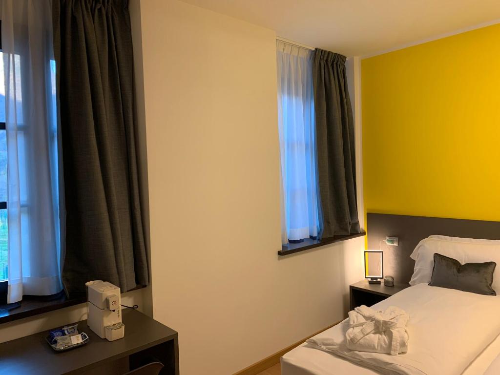 Voodi või voodid majutusasutuse Guest House Le Cassandre toas