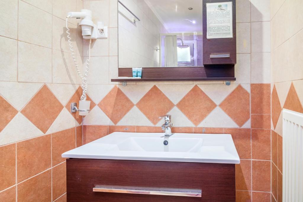 Koupelna v ubytování Vergina Star Hotel