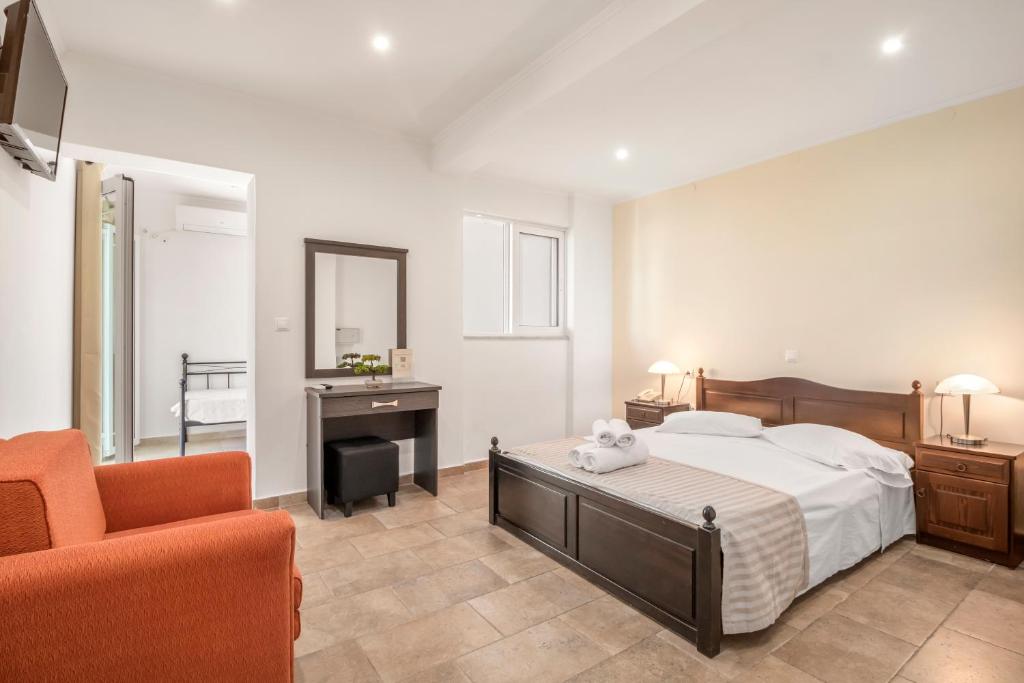 Postel nebo postele na pokoji v ubytování Vergina Star Hotel