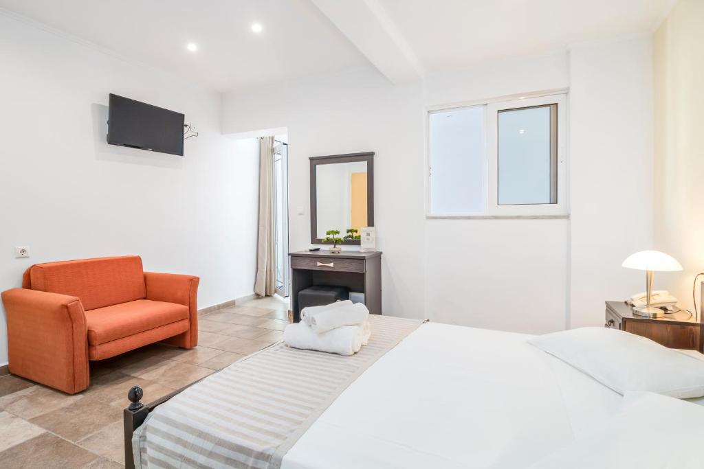 Postel nebo postele na pokoji v ubytování Vergina Star Hotel