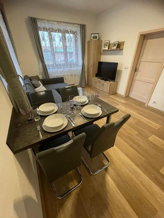 TV a/nebo společenská místnost v ubytování Rocky Apartment