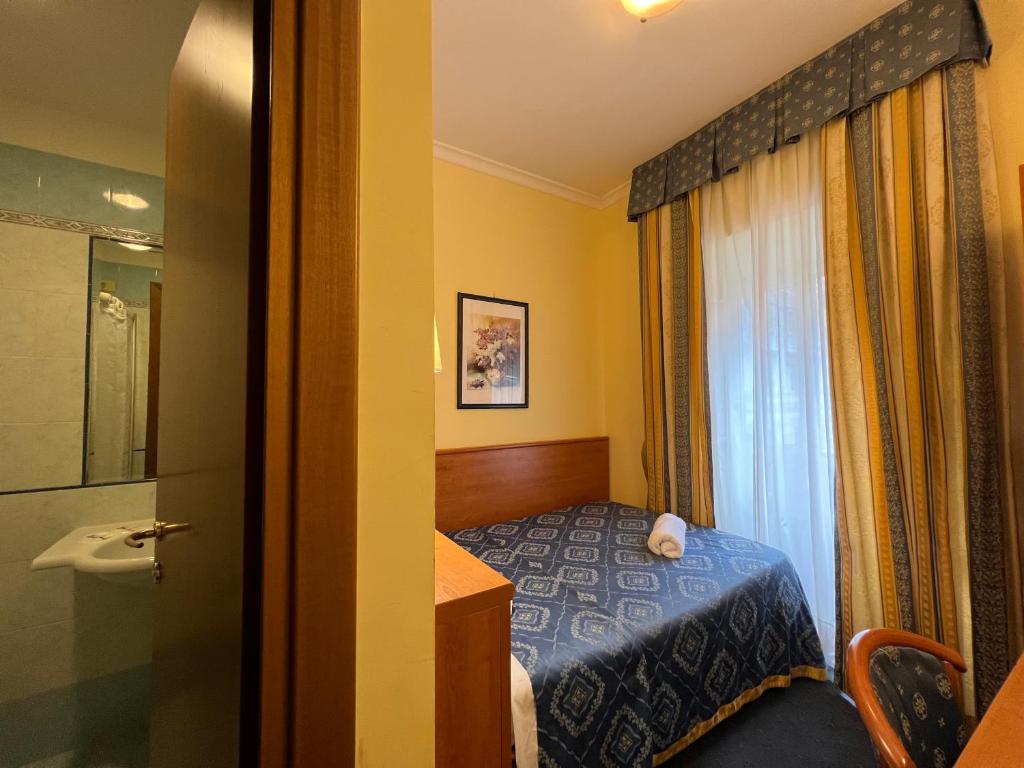 Postel nebo postele na pokoji v ubytování Baltik Guesthouse
