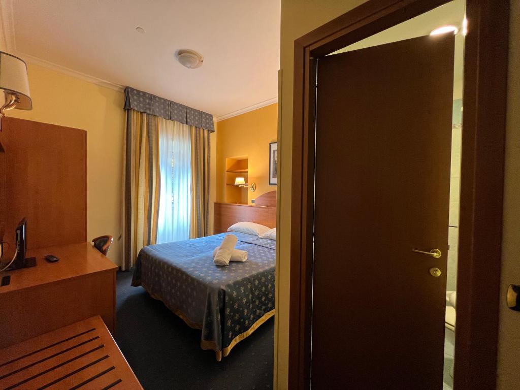Postel nebo postele na pokoji v ubytování Baltik Guesthouse