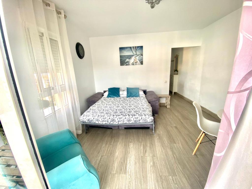 Postel nebo postele na pokoji v ubytování Iris Vistas Benalmadena