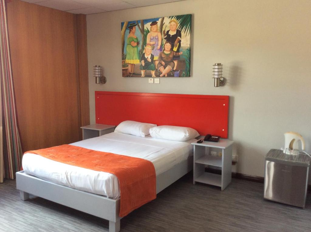 Postel nebo postele na pokoji v ubytování Champ de Mars B&B
