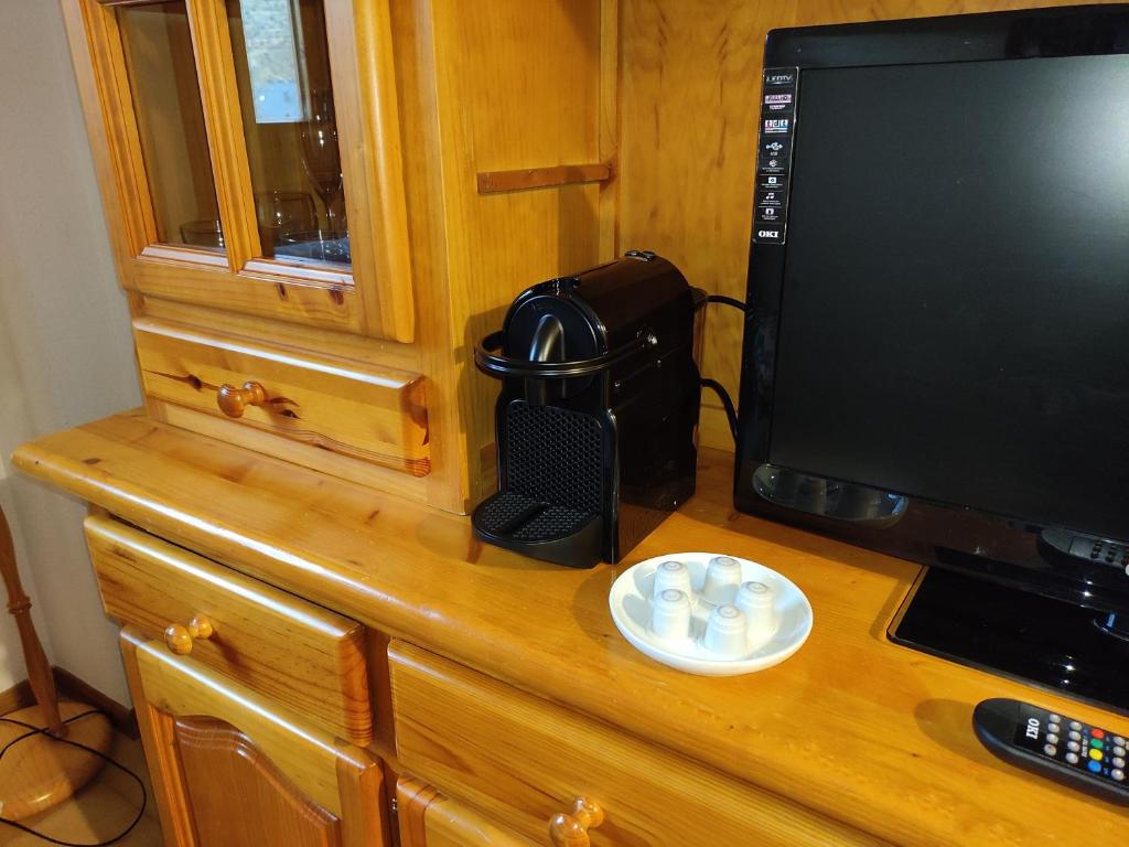 Televízia a/alebo spoločenská miestnosť v ubytovaní UNIQUE EXPERIENCE - Boí-Taüll Apartment