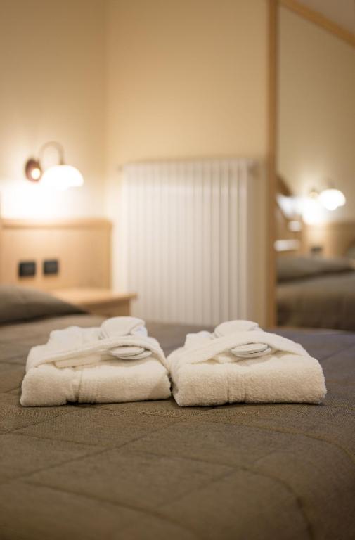 Postel nebo postele na pokoji v ubytování Hotel Crepei