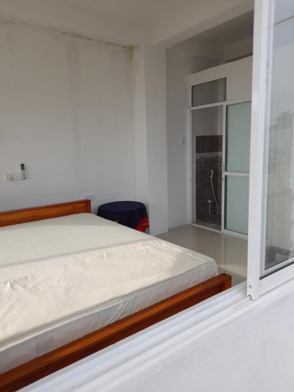Ένα ή περισσότερα κρεβάτια σε δωμάτιο στο Hotel Remember