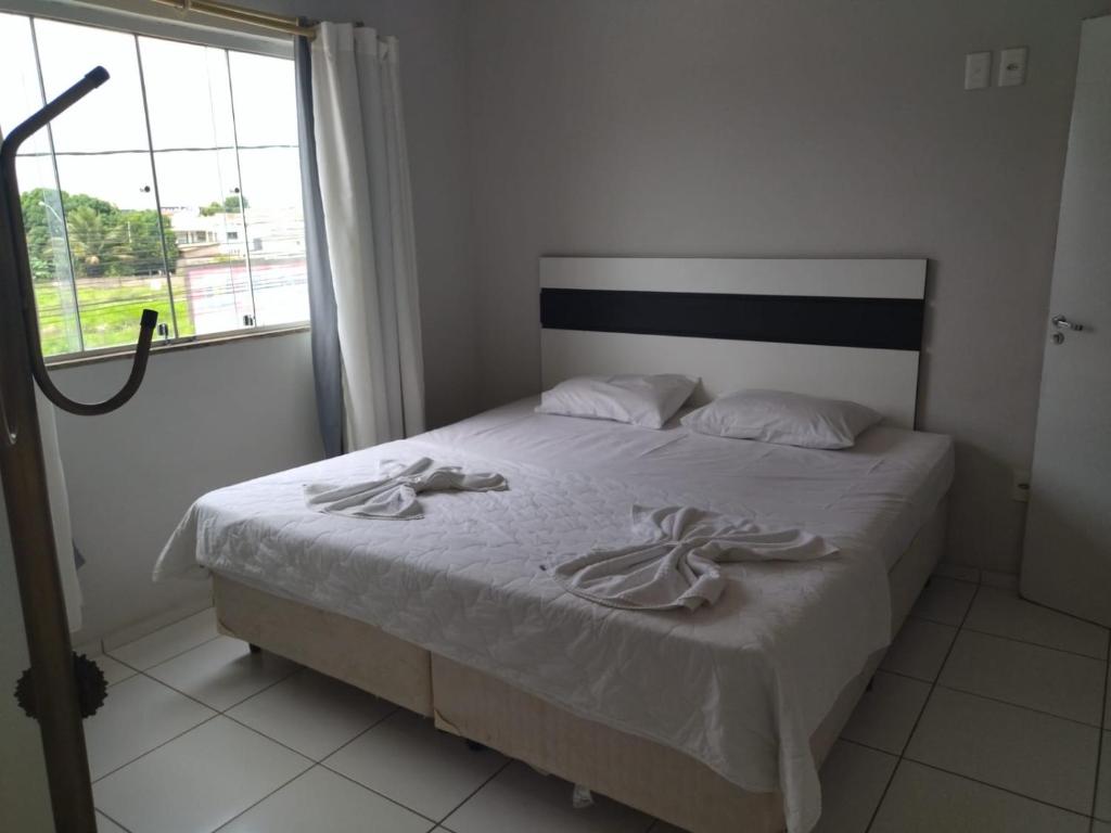 Postel nebo postele na pokoji v ubytování Hotel Caraipe