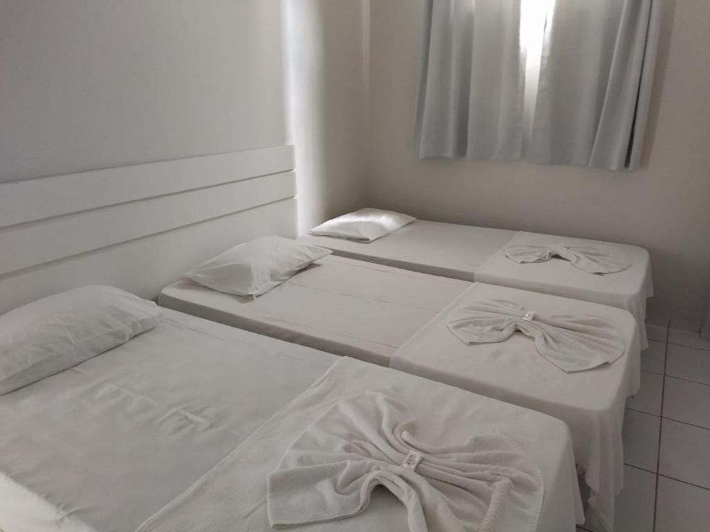 Postel nebo postele na pokoji v ubytování Hotel Caraipe