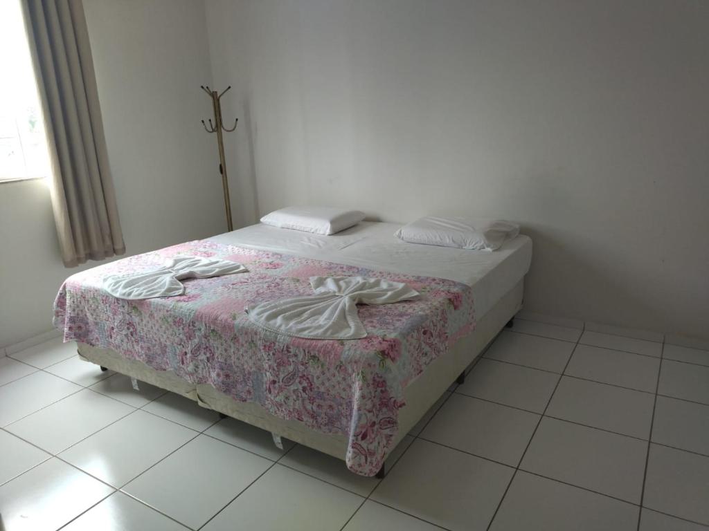Postel nebo postele na pokoji v ubytování Hotel Caraipe