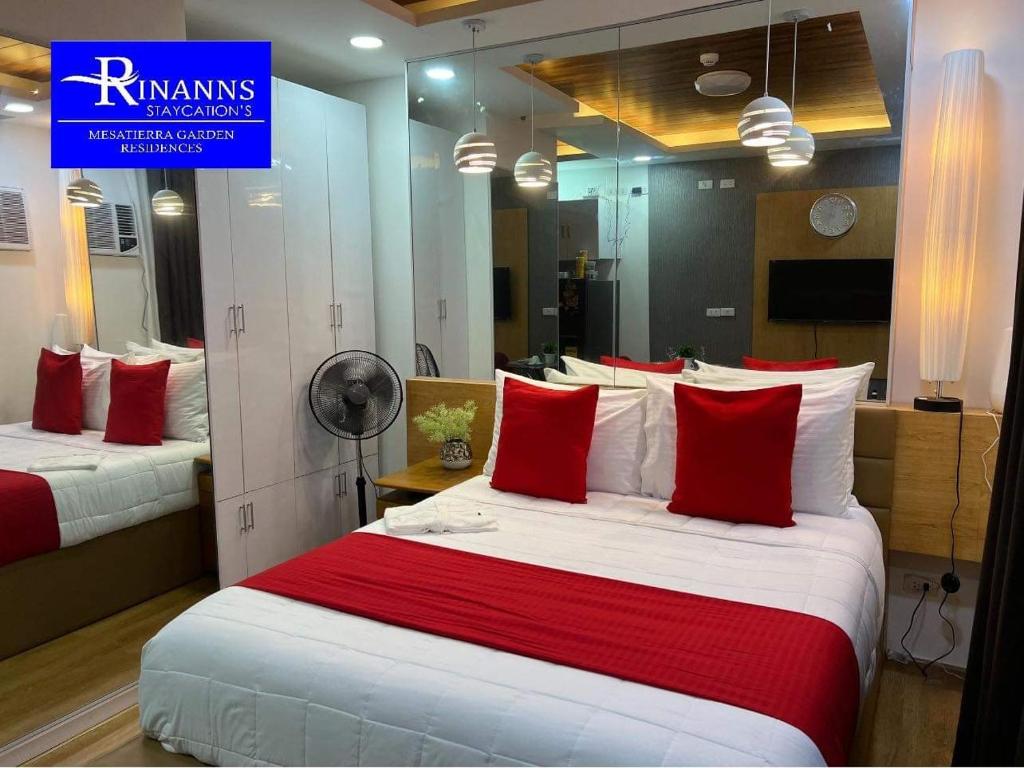 Postel nebo postele na pokoji v ubytování Rinann's Staycation 1021 Mesatierra Condotel Davao