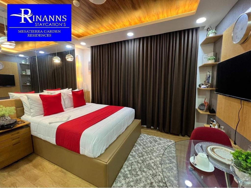 TV a/nebo společenská místnost v ubytování Rinann's Staycation 1021 Mesatierra Condotel Davao