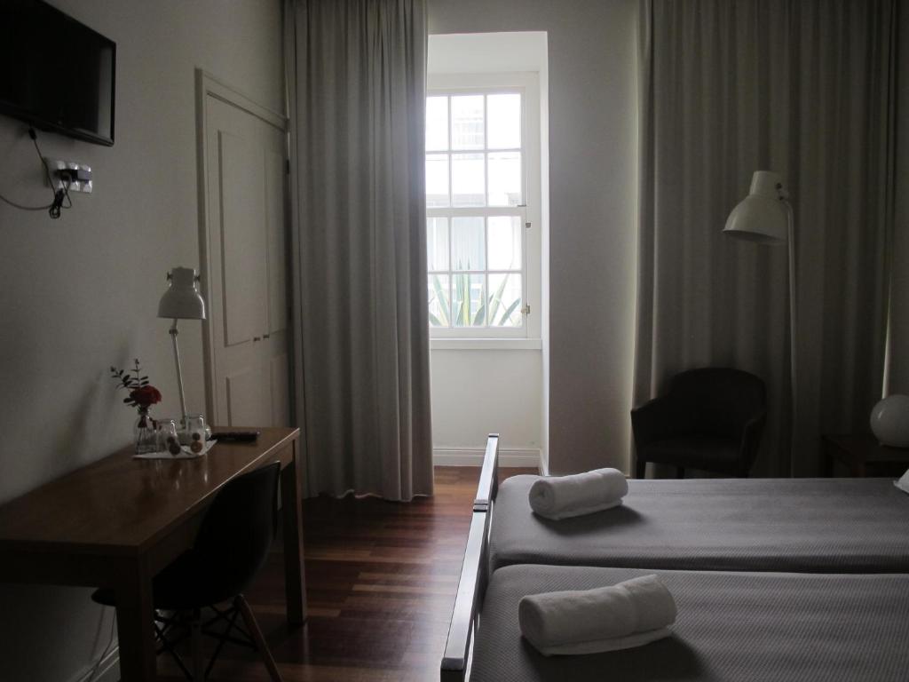 Postel nebo postele na pokoji v ubytování Azores Youth Hostels - Sao Miguel