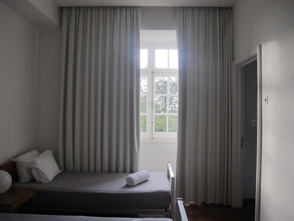 Postel nebo postele na pokoji v ubytování Azores Youth Hostels - Sao Miguel
