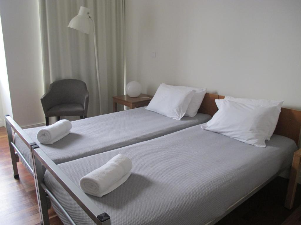 Postel nebo postele na pokoji v ubytování Azores Youth Hostels - Sao Miguel