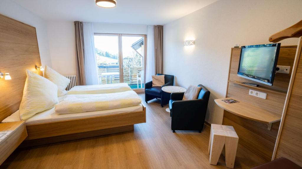 Postel nebo postele na pokoji v ubytování Gästehaus Wissler