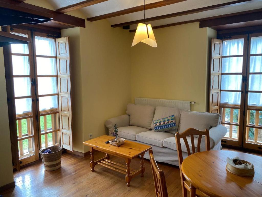 A seating area at Ahío San Martín, Apartamentos Rurales Casa de la Villa