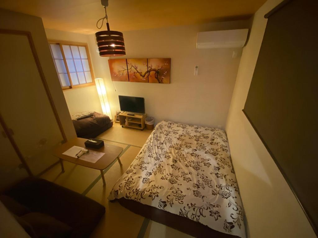 Postel nebo postele na pokoji v ubytování Hotel EL Shinjuku 6