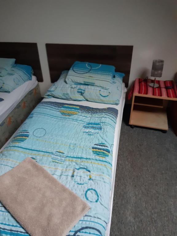 Postel nebo postele na pokoji v ubytování Penzion Oráč