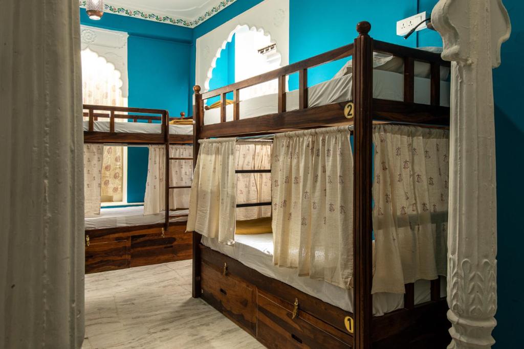 Postel nebo postele na pokoji v ubytování Hostel Mantra
