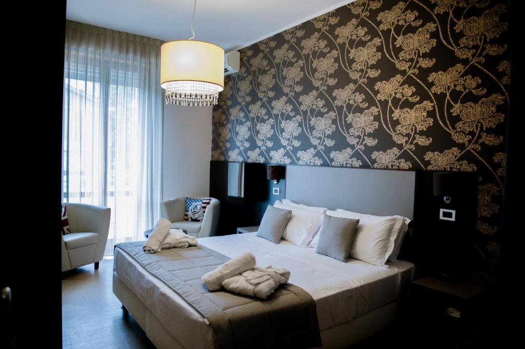 Postel nebo postele na pokoji v ubytování Hotel Lalla Beauty & Relax